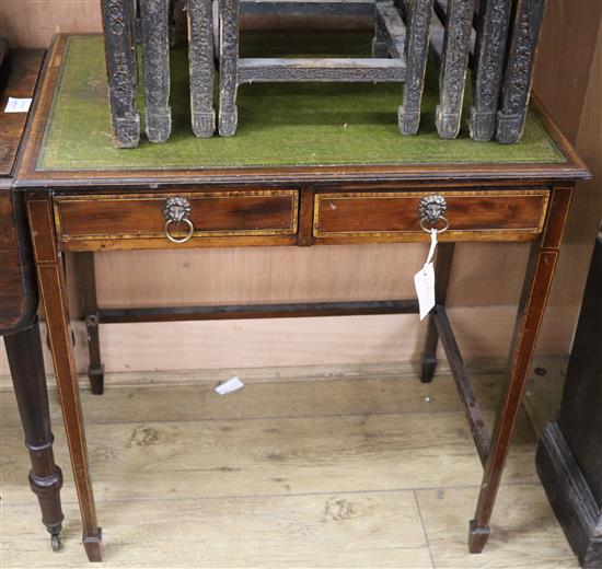 An Edwardian banded mahogany two drawer writing table W.68cm